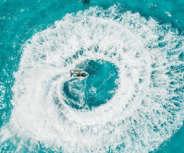 A person riding a jet ski A person riding a jet ski